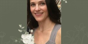 image of a white woman smiling into the camera with long brown hair. Three is an olive green background and white flowers adorning the image. White text reads: in Loving Memory of Amy St. Pierre